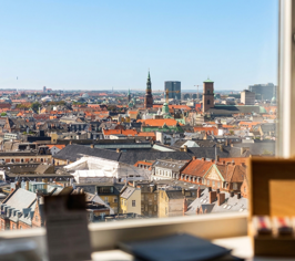 View over Copenhagen through a window from a room