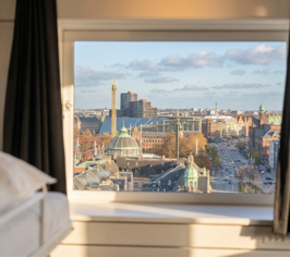 View over Copenhagen through a window from a room