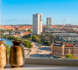 View over Copenhagen through a window from a room