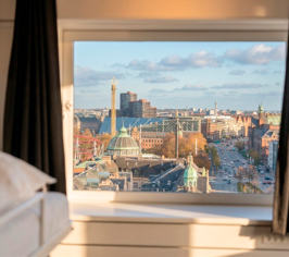 View over Copenhagen through a window from a room